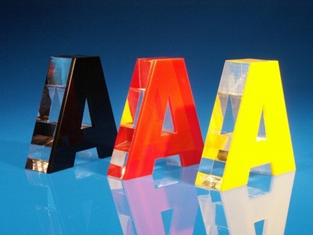 Acrylglas Buchstaben Sandwich farblos mit schwarz rot gelb