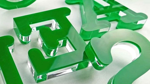 Acrylglas Buchstaben Sandwich farblos mit grün